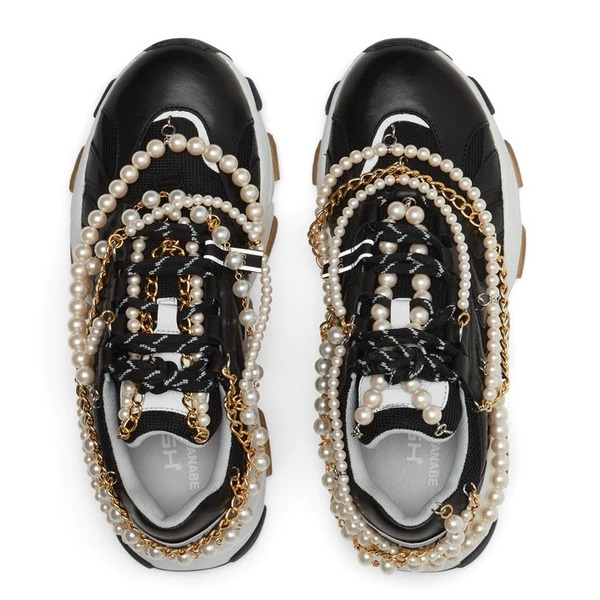 Luxurious Chains and Pearls Adorn the Junya Watanabe ASH